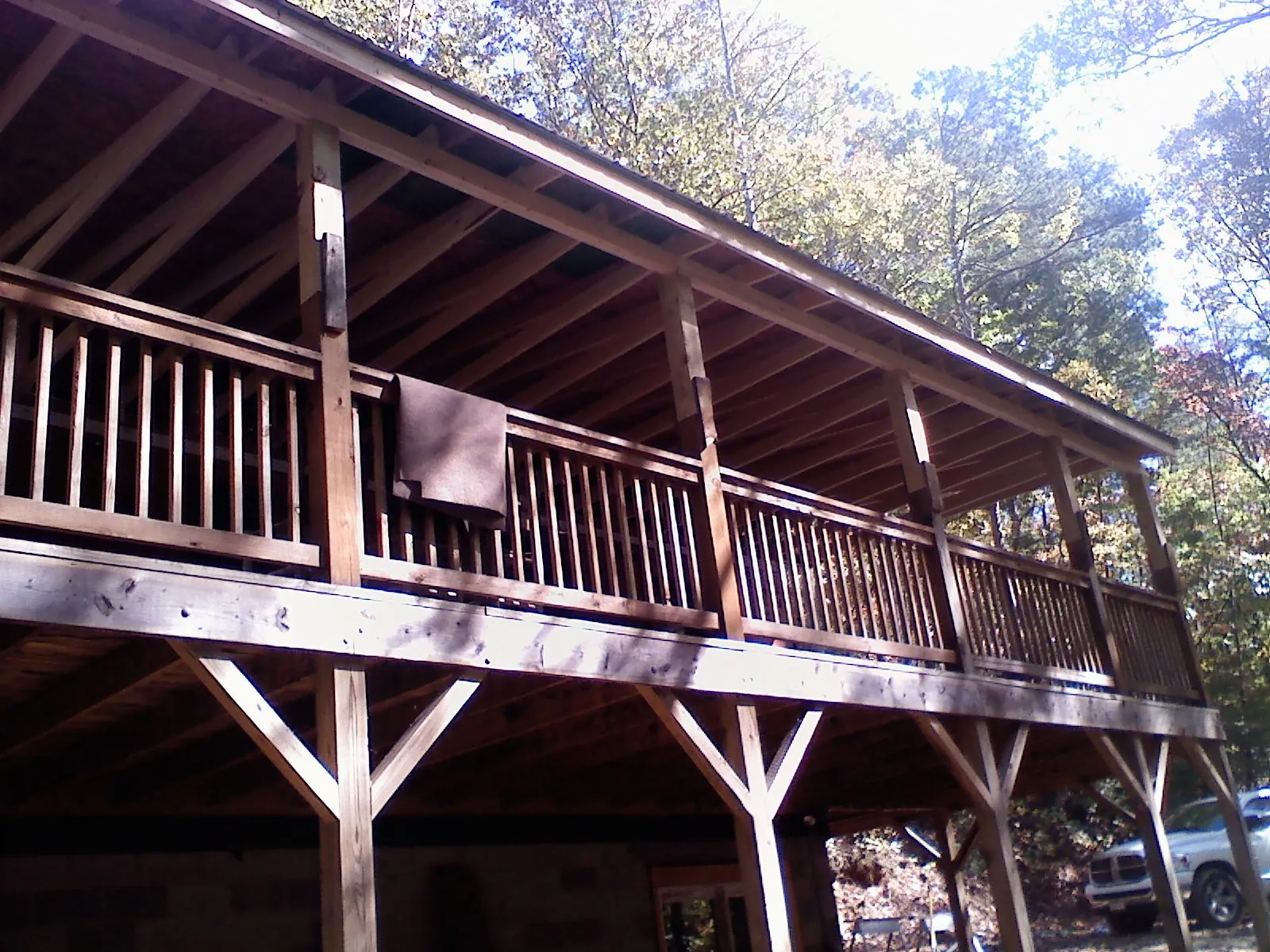 Timber framing under a new elevated porch and deck in Coopersburg